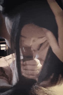 Asian slut making full use of hand and cock-sucking lips to blow thick cock'